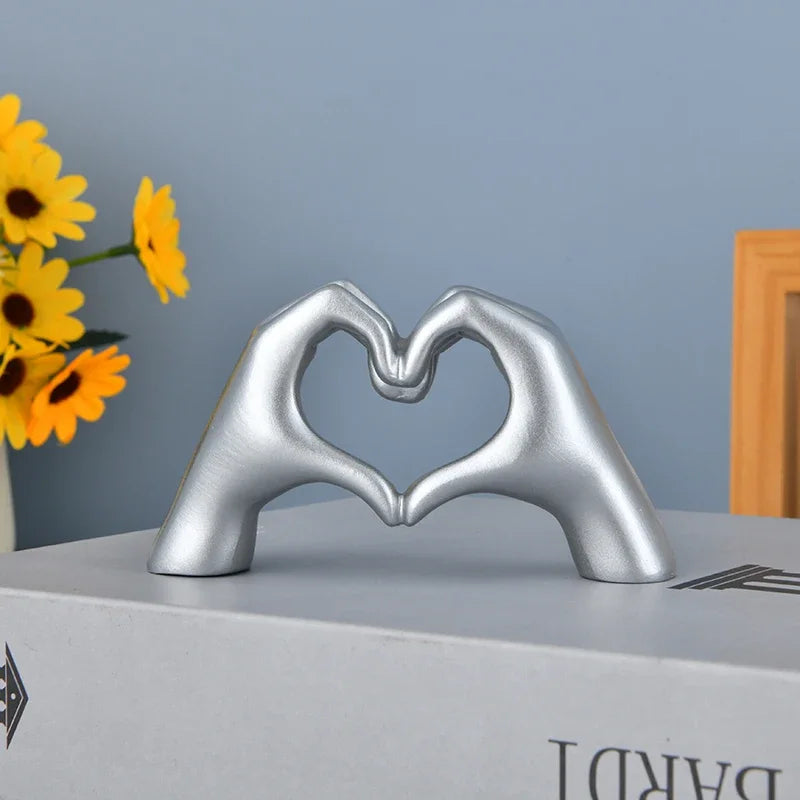 Gold Heart Hand Sculpture – Modern Love Gesture Decor