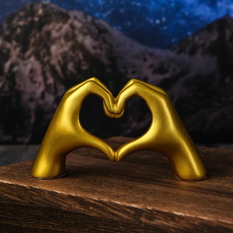 Gold Heart Hand Sculpture – Modern Love Gesture Decor